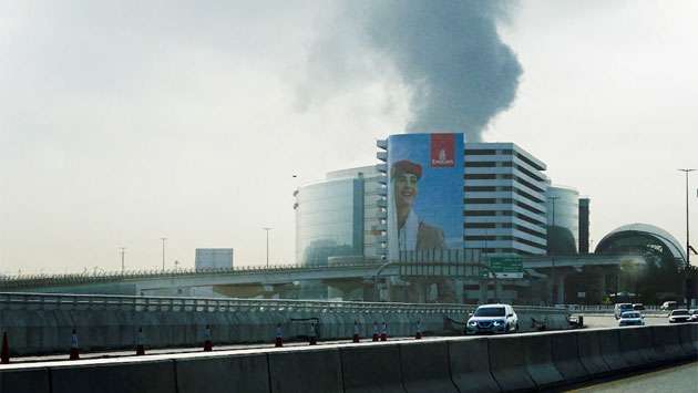 Dubai airport resumes some flights after drone attack caused fuel tank blaze