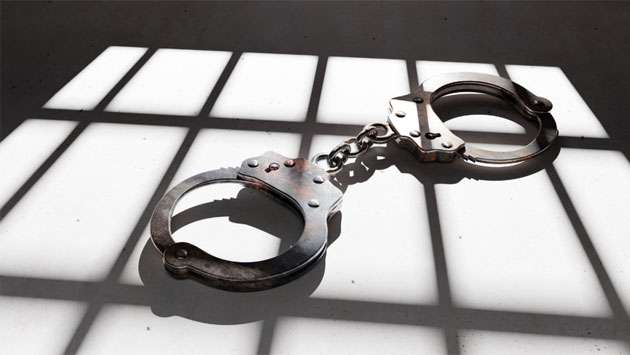 Two prison officials arrested over inmate death at Magazine prison