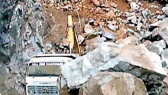 Rock rolls down the hill crushing two workers to death