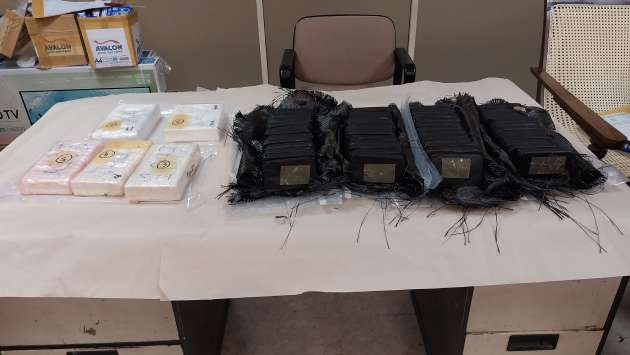 Large cocaine slabs detected first time at BIA with Canadian Caucasian male