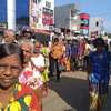 Queues back, people jostle for rice purchases