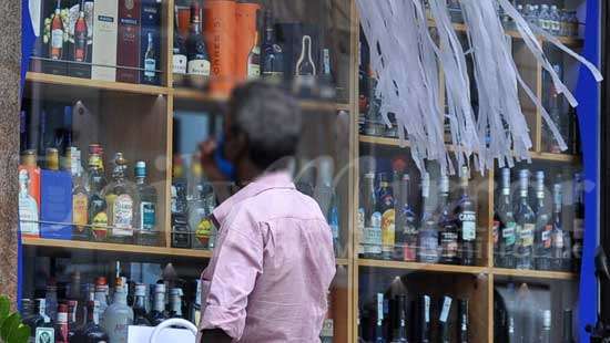 Queues at supermarket liquor shops