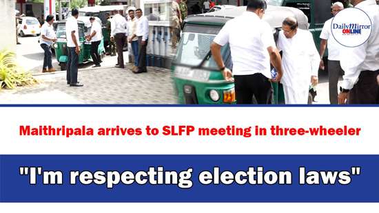 Maithripala arrives to SLFP meeting in three-wheeler ’’I’m respecting election laws’’