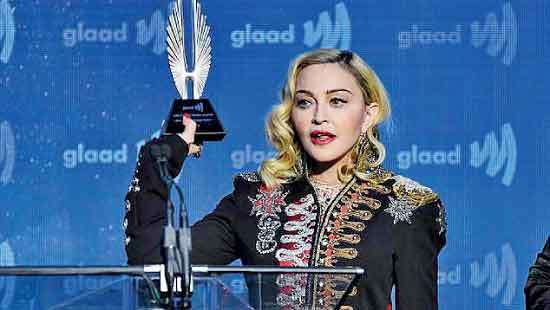 Madonna will direct her own biopic