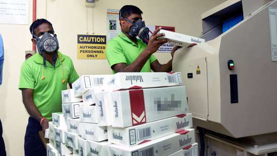 Customs destroy counterfeit cigarettes