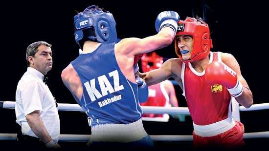 https://www.dailymirror.lk/sports/Hettiarachchi-Sandeepani-shine-as-Hemamali-creates-boxing-history/244-320935