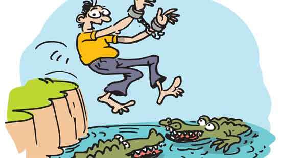 Handcuffed suspect jumps into crocodile pit in escape bid at Millaniya