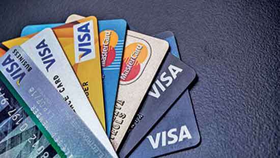 Credit card holders yet to spend more on their cards while consumer spend recovers