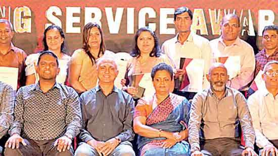 Pan Asia Bank honours longstanding staff at special awards night