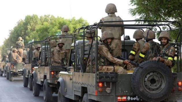 Pakistan militants attack train and take passengers hostage