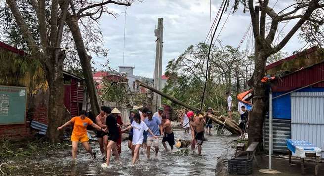 Vietnam death toll climbs to 197 as typhoon’s aftermath brings flash floods and landslides