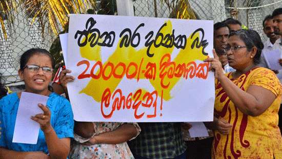 Demanding Rs. 20,000 pay hike