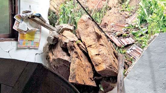 Elderly man pinned under a boulder that rolled down a hill