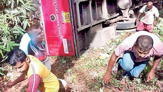 SLTB bus goes down precipice at Induruwa 12 passengers injured