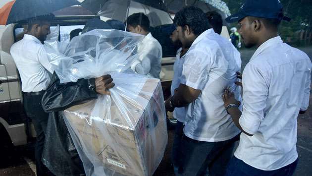 Ballot boxes to counting centres...