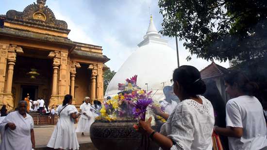 Seeking blessings on Esala Poya day