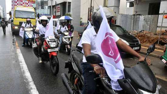 Walk-vehicle parade to support SL Cricket Team