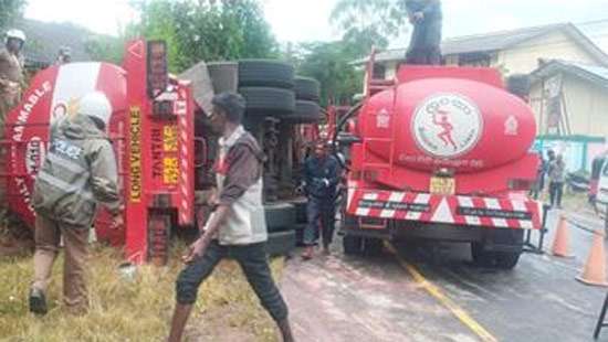 Bowser carrying 30,000 litres of diesel topples in Haputale