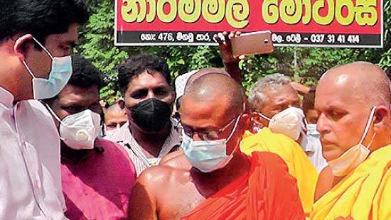 Peellakanda forest reserve at Dampelessa in Narammala Protest staged against earth and gravel mining