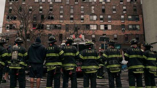 New York fire: At least 19 killed in apartment block blaze