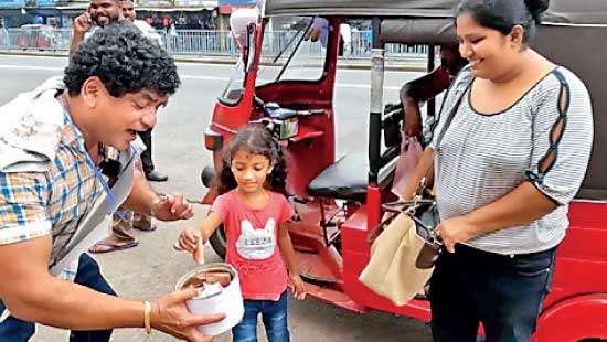 Compensation for Easter Sunday Attack victims  Maithripala accepts Rs.1,810 collected from begging