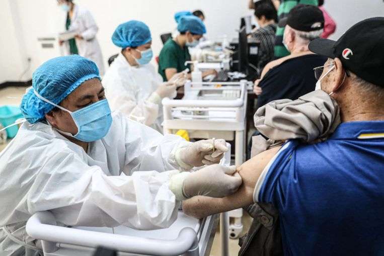 China says it saw about 0.01% adverse events from Covid-19 vaccines