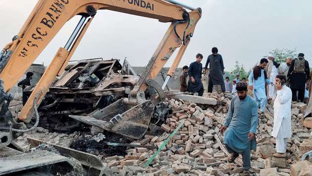 Car bombing and shootout kills 14 Pakistani police officers