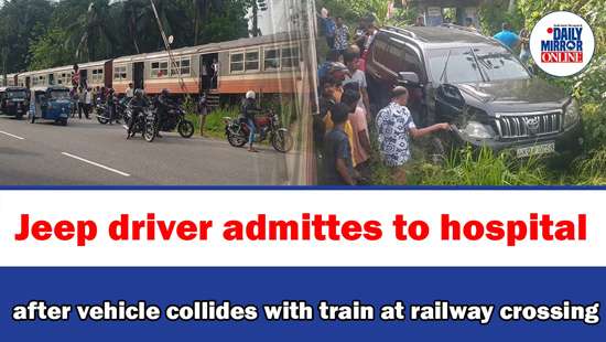 Jeep driver admittes to hospital after vehicle collides with train at railway crossing