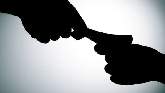 Two cops face interdiction for soliciting bribe from man violating travel restrictions