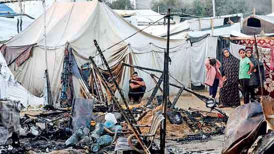 Patients burnt alive in tents - Auschwitz in reverse?