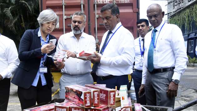 Customs destroy counterfeit cigarettes