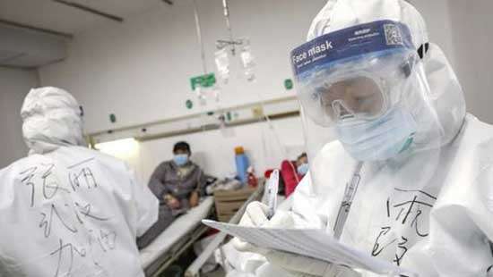 China toll leaps past 1,600 as new cases slow