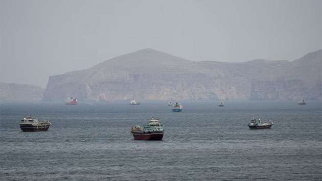 Iran tightens control of Hormuz after US calls off renewed attacks