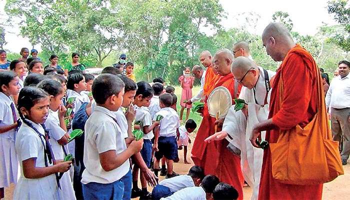 Korean Maha Viharaya delegation visits Nawagaththegama school