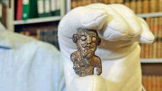 Denmark unveils smiling figurine thought to be Viking ‘portrait’