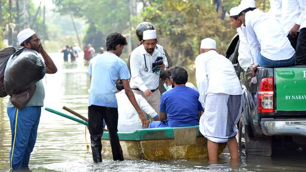 Medical team helps flooded residents...