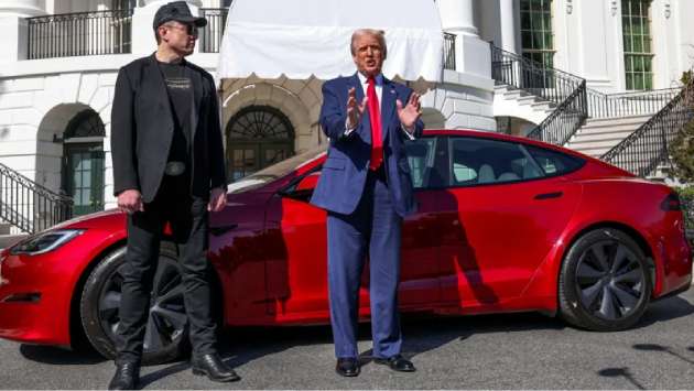 Musk to reduce Doge role after Tesla profits plunge