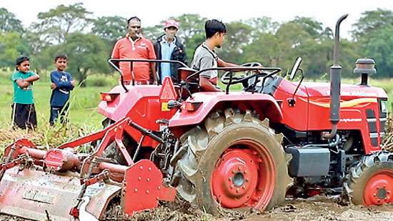 DIMO and Mahindra Tractors assist local farmers with free land preparation during Maha season