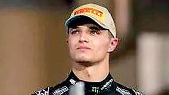 Racing champ Norris kept waiting for trophy