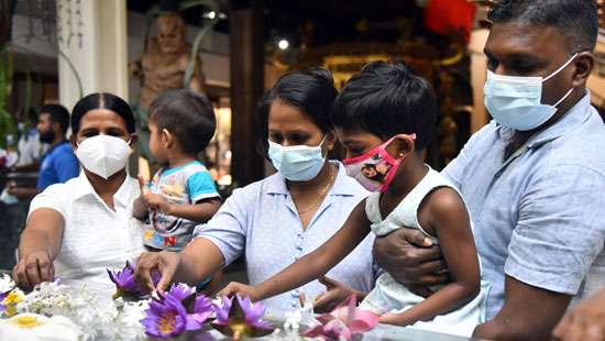 Seeking blessings on Navam Poya