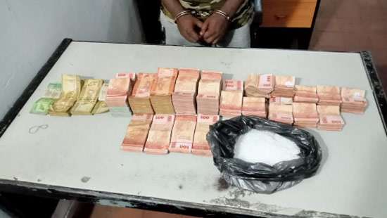 Man with drugs, money worth Rs. 10Mn nabbed in Kotahena