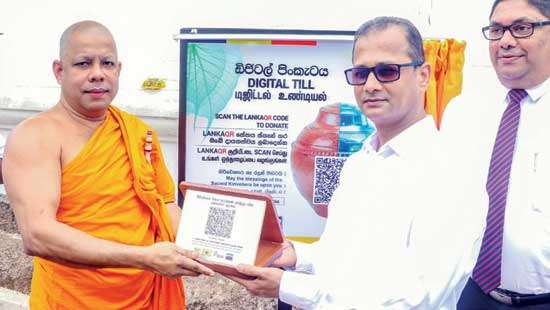 BOC installs Digital Tills on Kiri Vehera, Kataragama Devalaya premises
