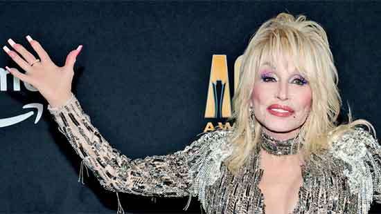 ‘I ain’t dead yet!’ Dolly Parton reassures fans after scare