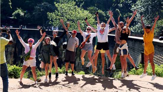 Tourists having fun near Nine Arch bridge