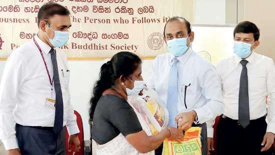 People’s Bank Buddhist Society donates dry rations to needy families