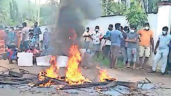 Residents of isolated village in Ratnapura protest demanding relief