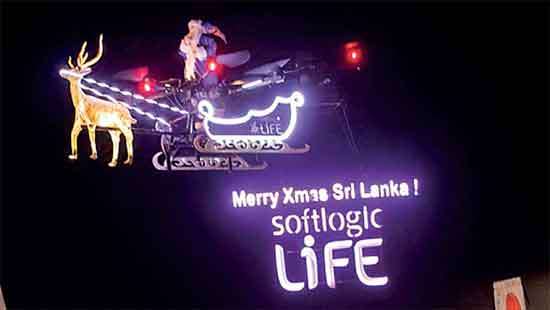 Softlogic Life flies Santa onto Galle Face Green sky