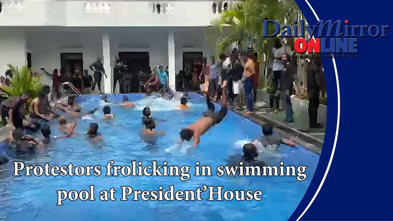 Protestors frolicking in swimming pool at President’ House