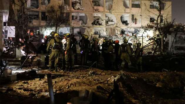 Iran strikes towns near Israel’s nuclear site, wounds over 100