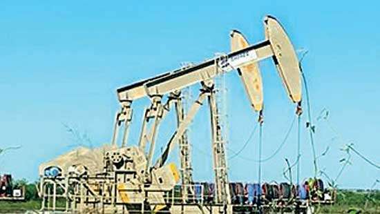 Oil rises on Red Sea jitters, ample supply weighs